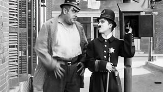 Charlie Chaplin - Easy Street - 1917