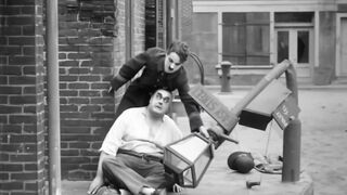 Charlie Chaplin - Easy Street - 1917