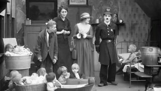 Charlie Chaplin - Easy Street - 1917